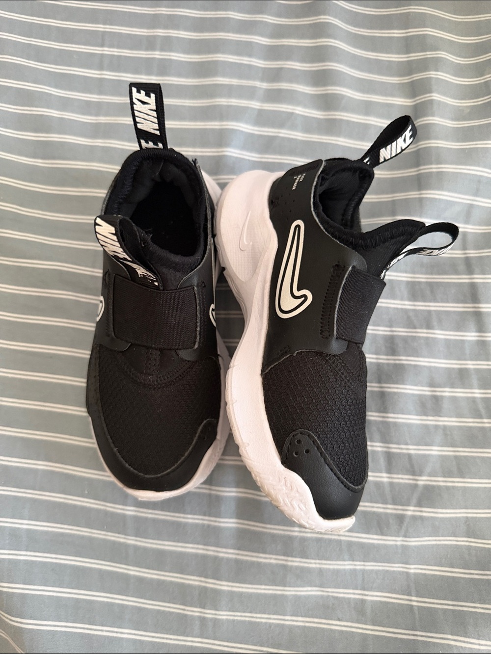 Nike Kids Black and White Slip-On Athletic Sneakers